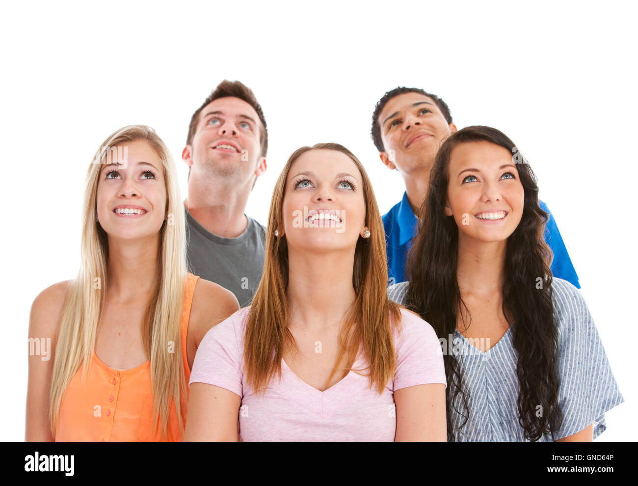 Multi-ethnic group of teens with Caucasian and African-American girls and boys in casual wear. Stock Photo