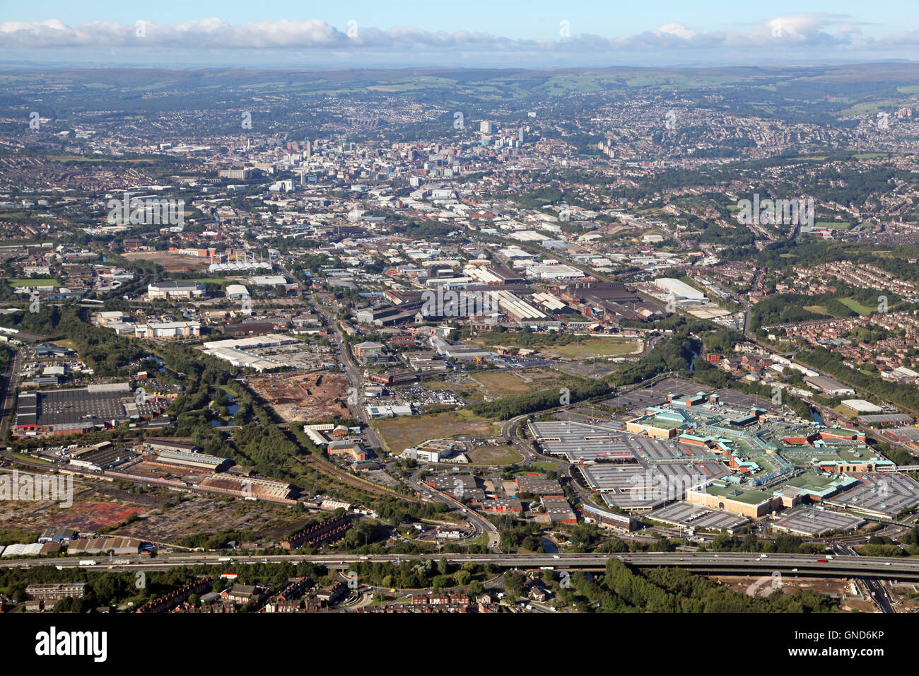 aerial view of the Sheffield city skyline with the M1 & Meadowhall in the foreground, UK Stock Photo
