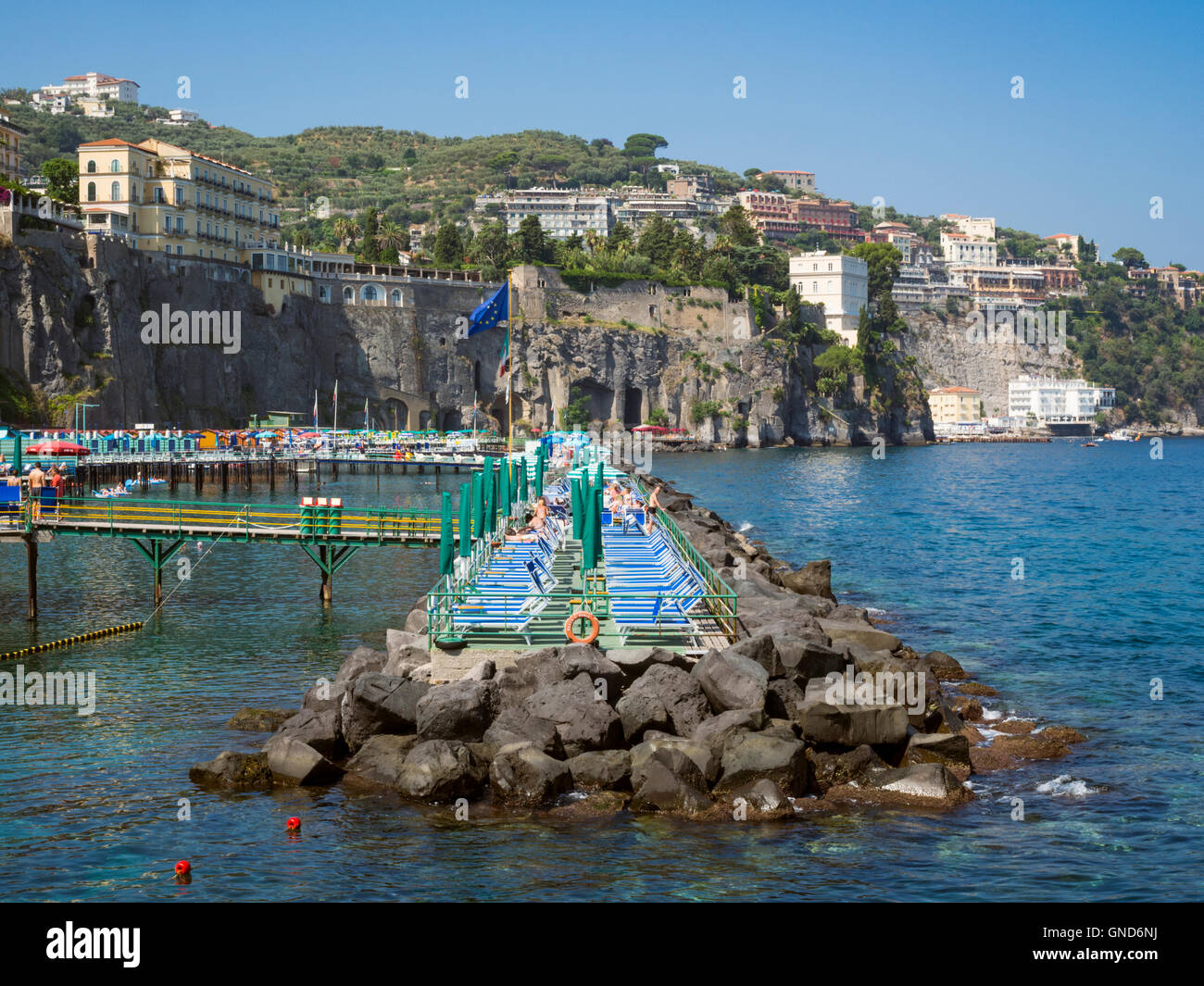Cliff top hotels and bathing area in Sorrento Italy Stock Photo
