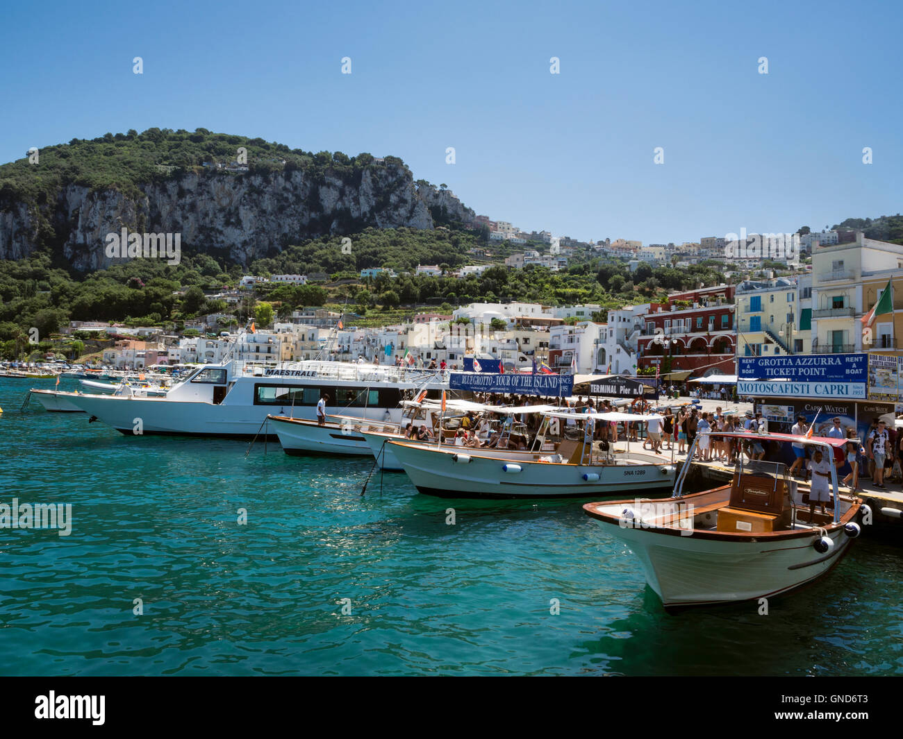 Tourist boats moored in Marina Grande at Capri, Italy Stock Photo