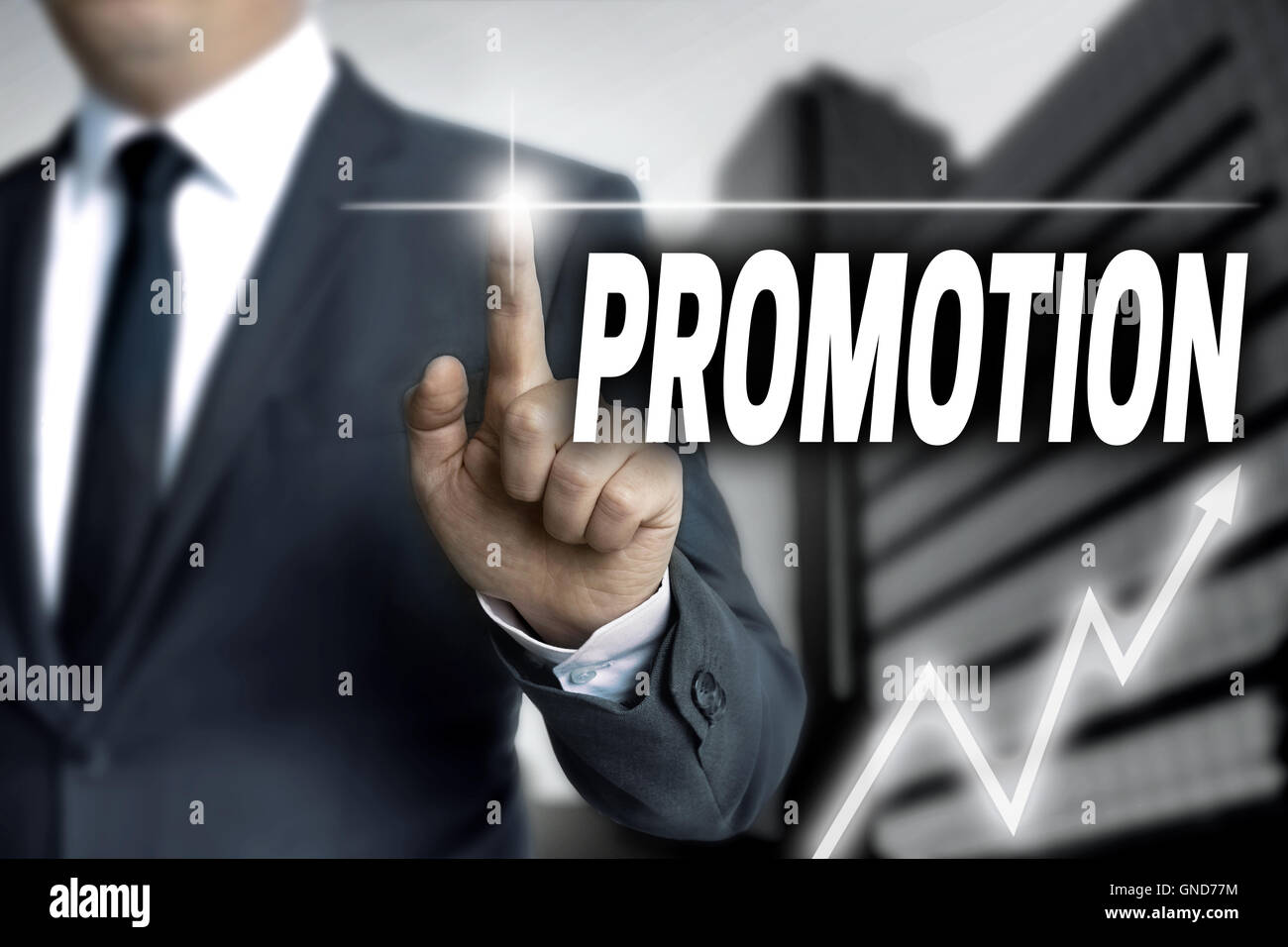 Promotion touchscreen is operated by businessman. Stock Photo