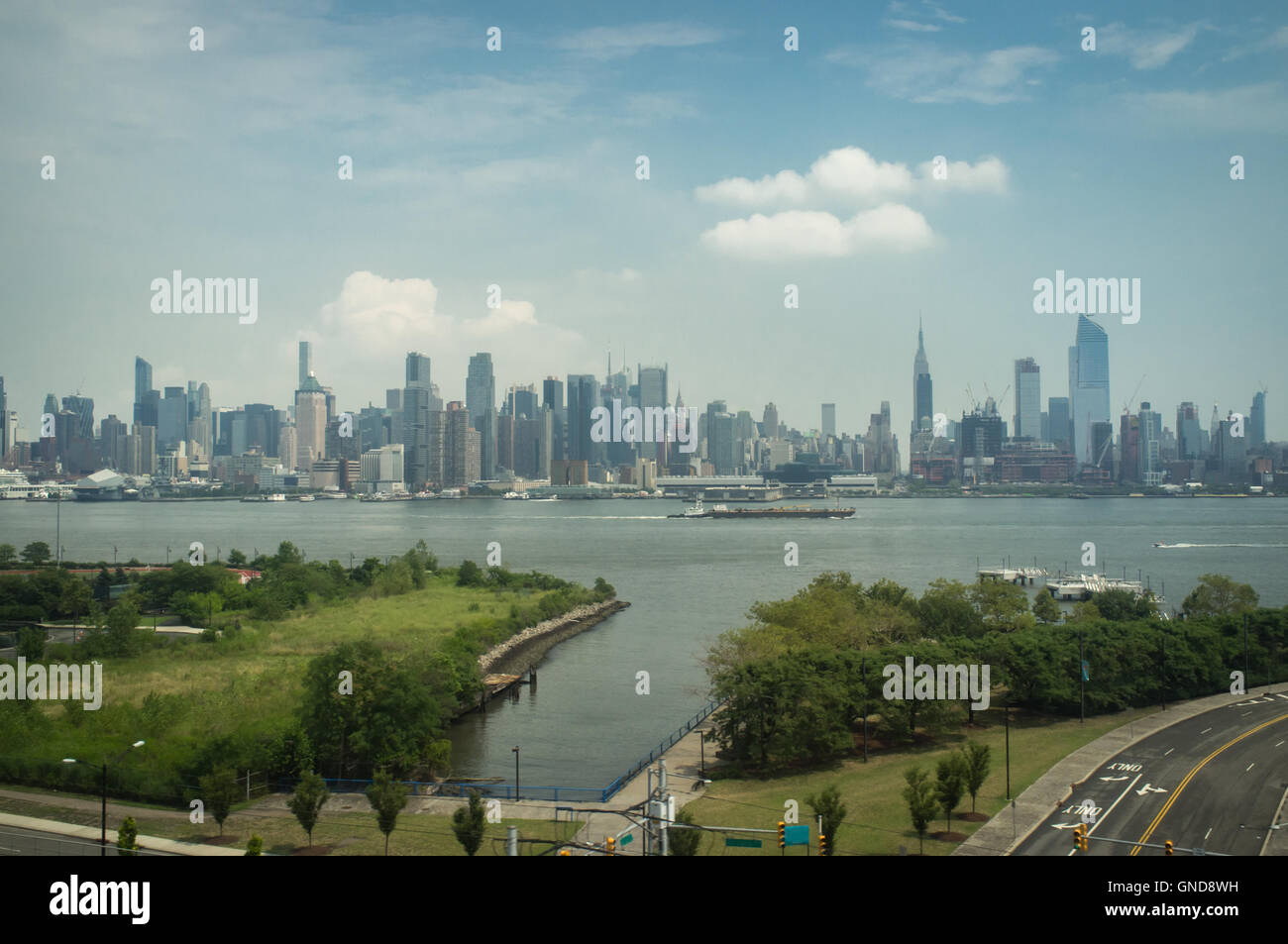 Beautiful New York City skyline against summer blue sky Stock Photo - Alamy