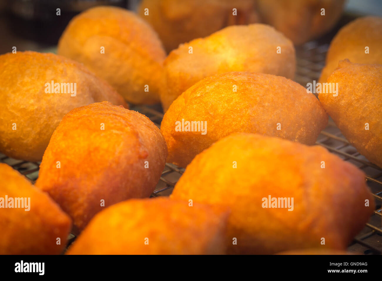 Tray of fresh hot deep fried zeppole donuts Stock Photo Alamy