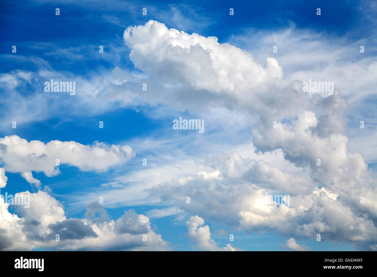 White clouds on the blue summer sky Stock Photo