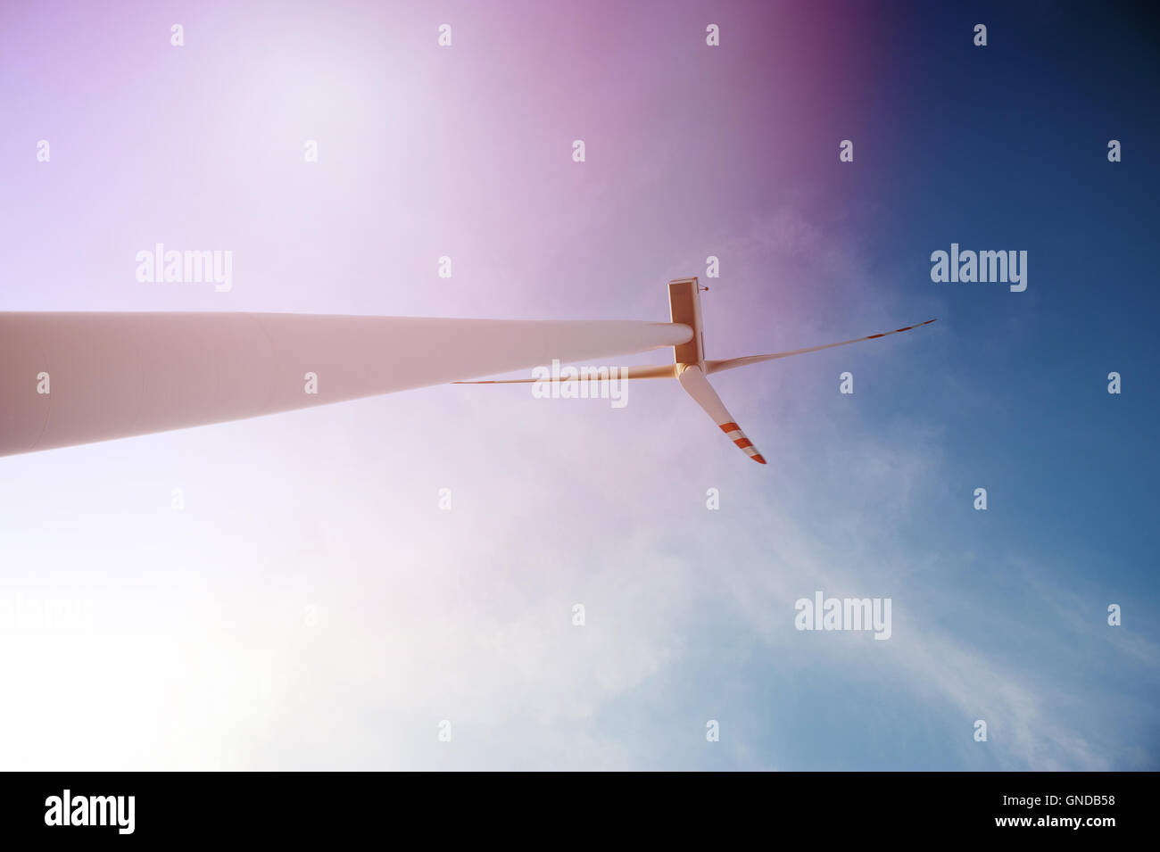 Wind turbine against deep blue sky Stock Photo - Alamy