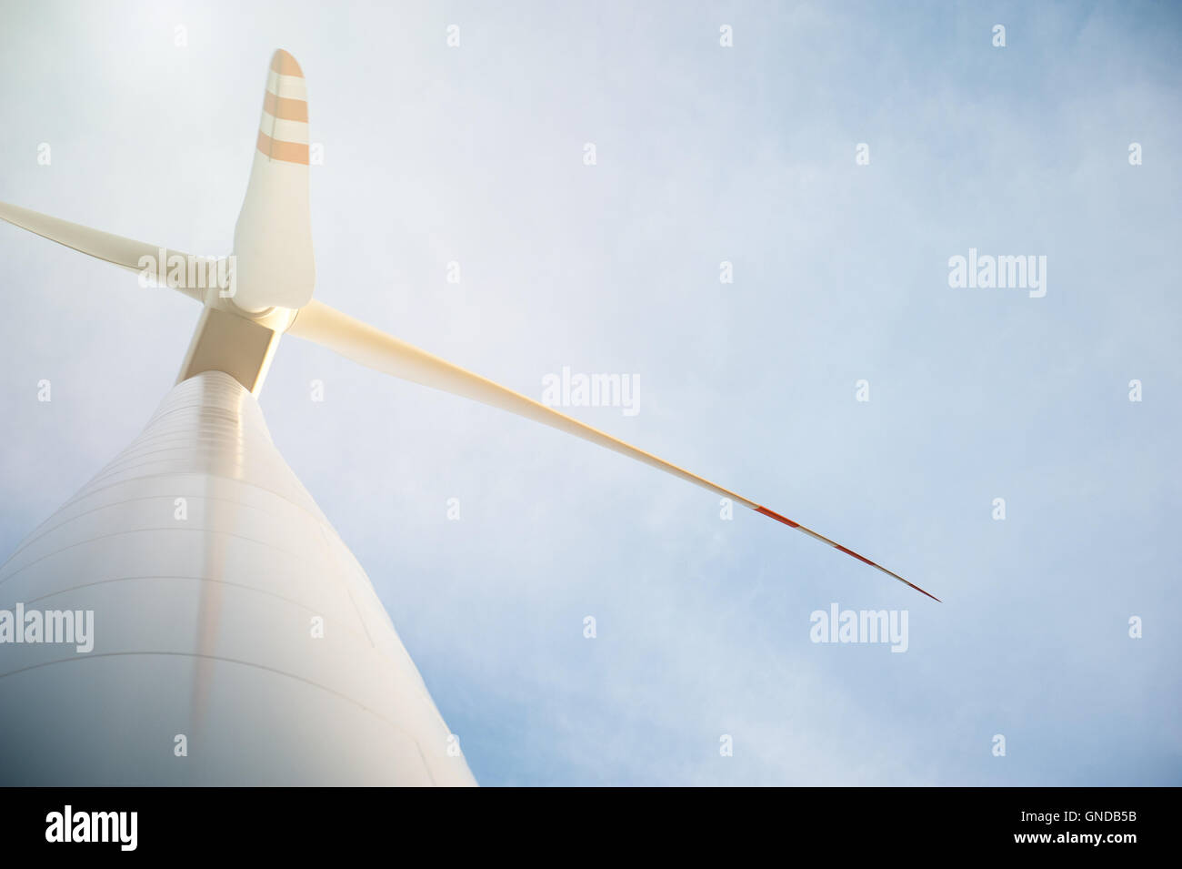 Wind turbine against deep blue sky Stock Photo - Alamy