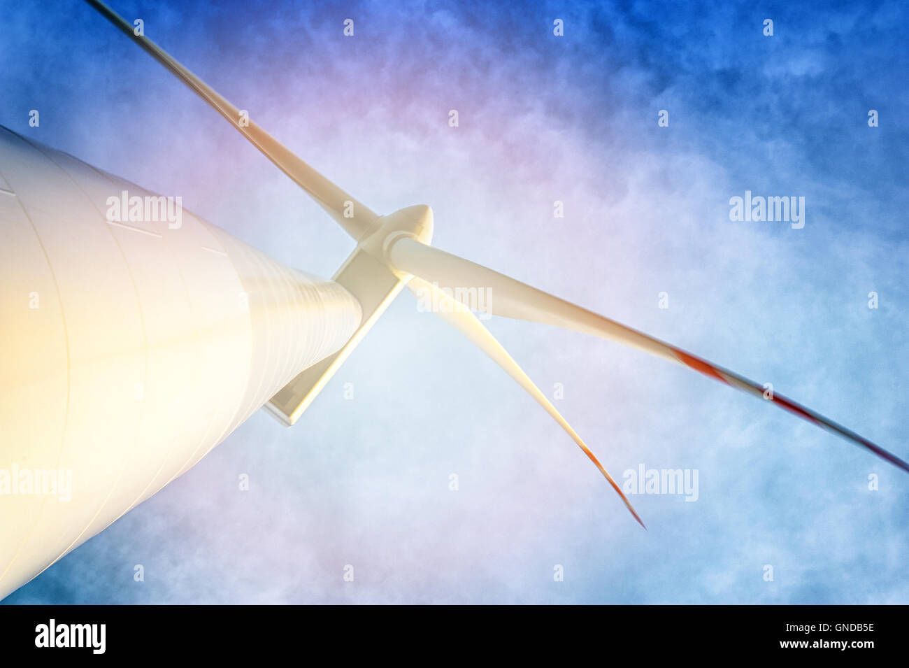 Wind turbine against deep blue sky Stock Photo - Alamy