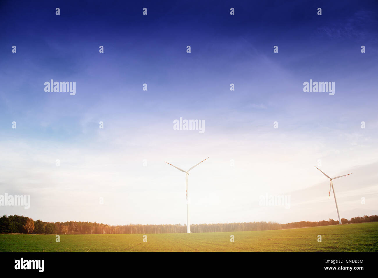 Wind turbine against deep blue sky Stock Photo - Alamy