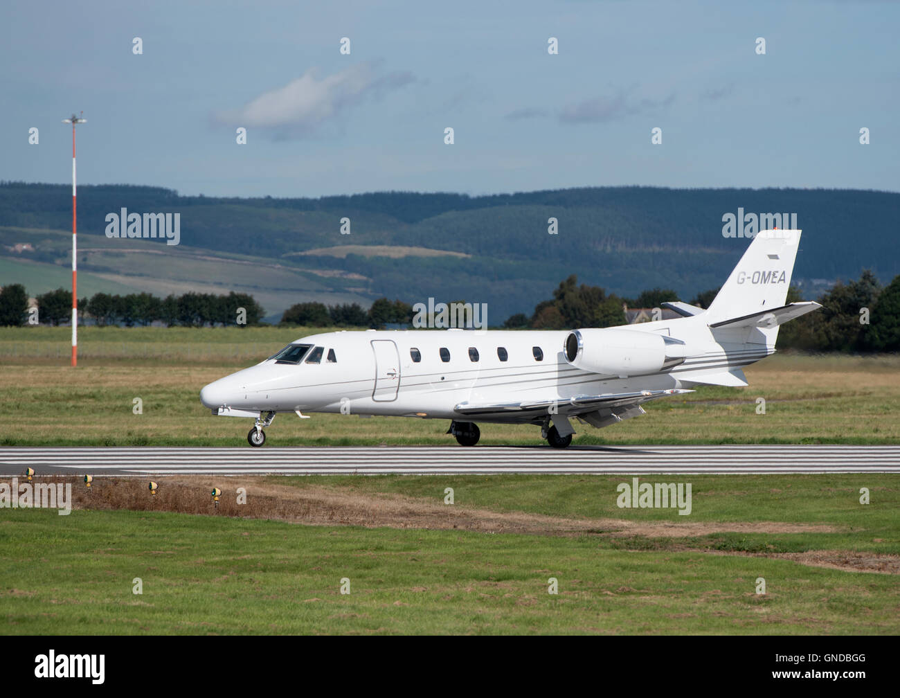 A 2006 Luton Based Cessna Citation XLS G- Jet leaving Inverness Scottish Airport. SCO 11,208. Stock Photo