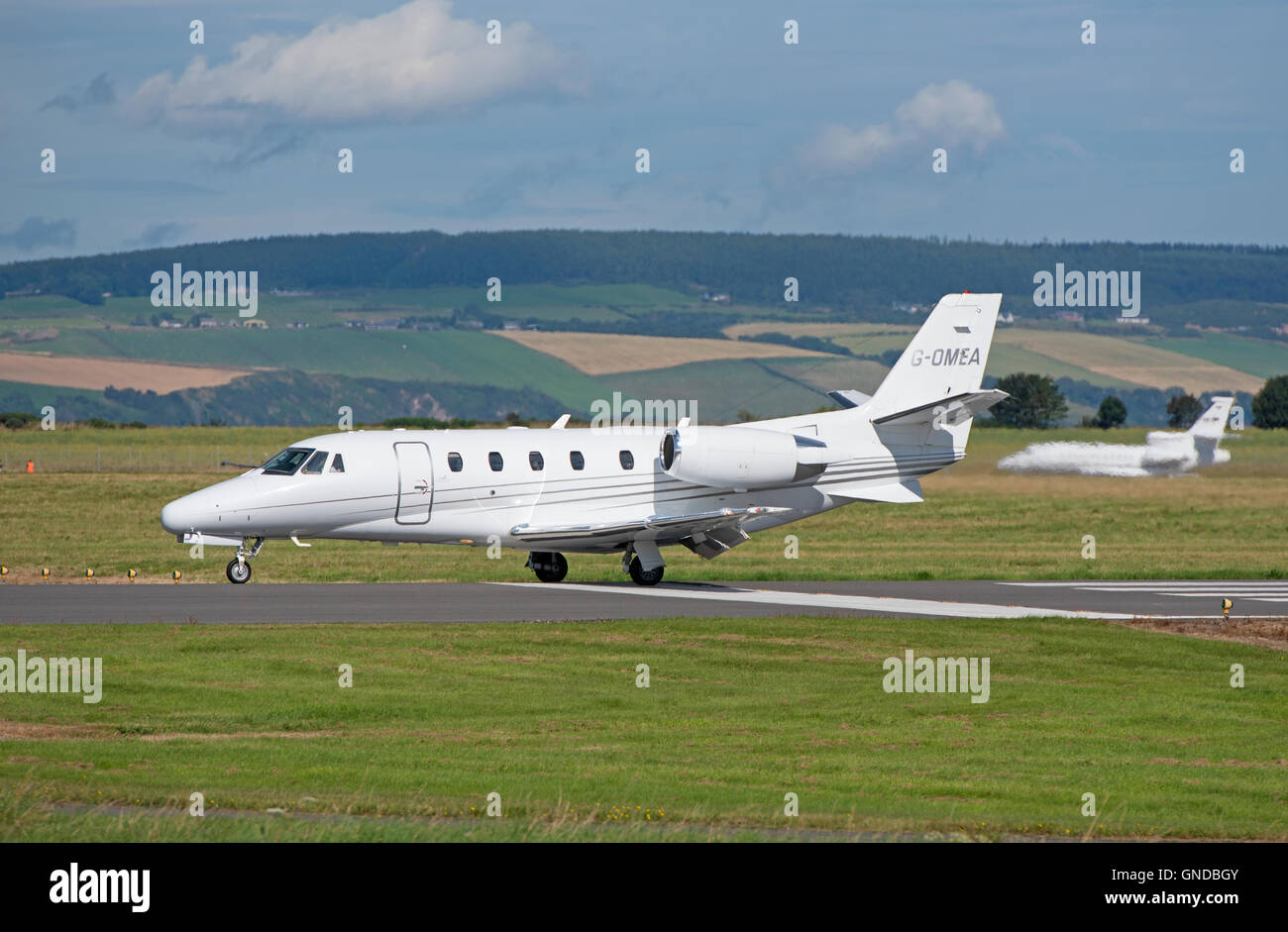 A 2006 Luton Based Cessna Citation XLS  Jet leaving Inverness Scottish Airport. SCO 11,209 Stock Photo