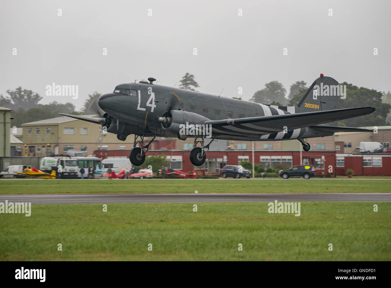 Douglas DC-3 Dakota of Aces High, taking off from Dunsfold. Stock Photo