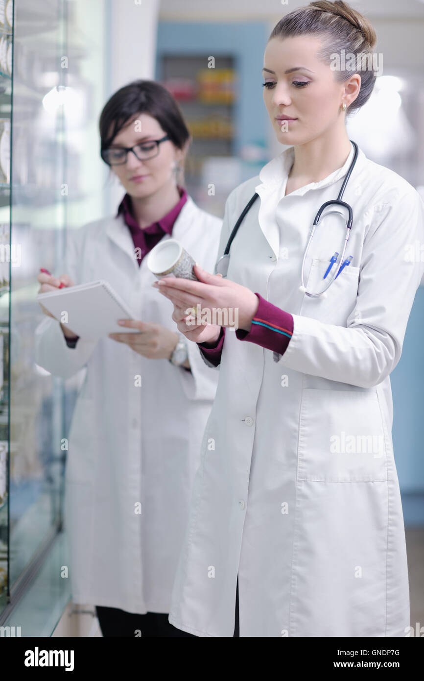 team of pharmacist chemist woman in pharmacy drugstore Stock Photo - Alamy