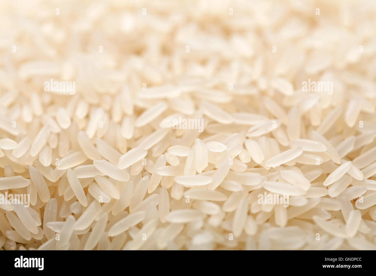raw rice background Stock Photo - Alamy