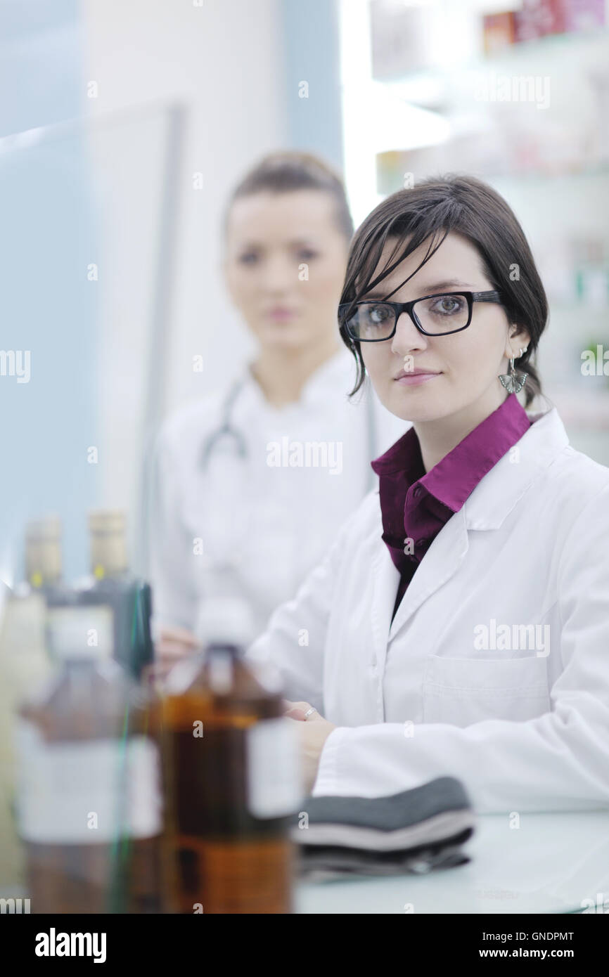 team of pharmacist chemist woman in pharmacy drugstore Stock Photo - Alamy