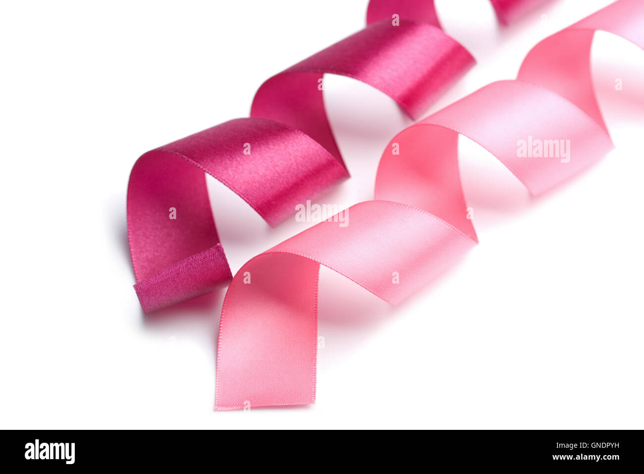 holiday pink ribbons isolated Stock Photo - Alamy