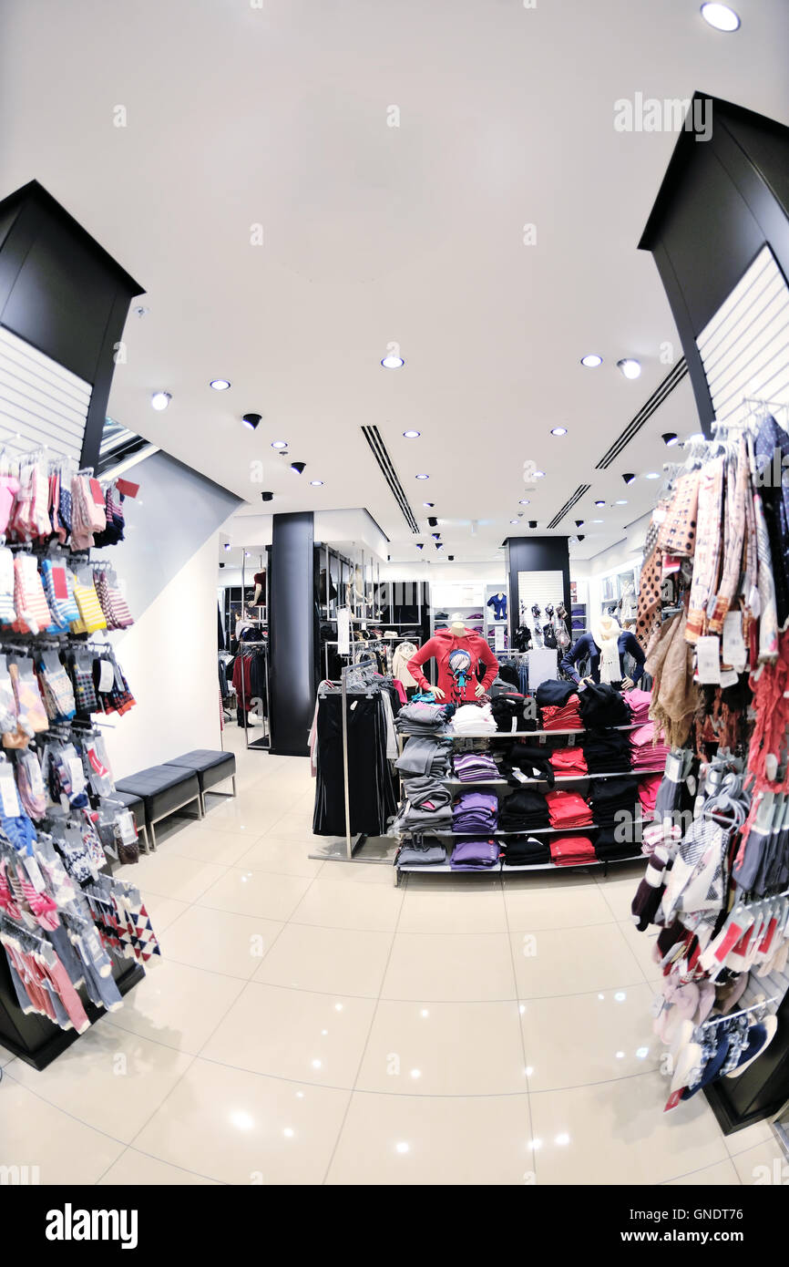 Fancy clothes in shop Stock Photo - Alamy