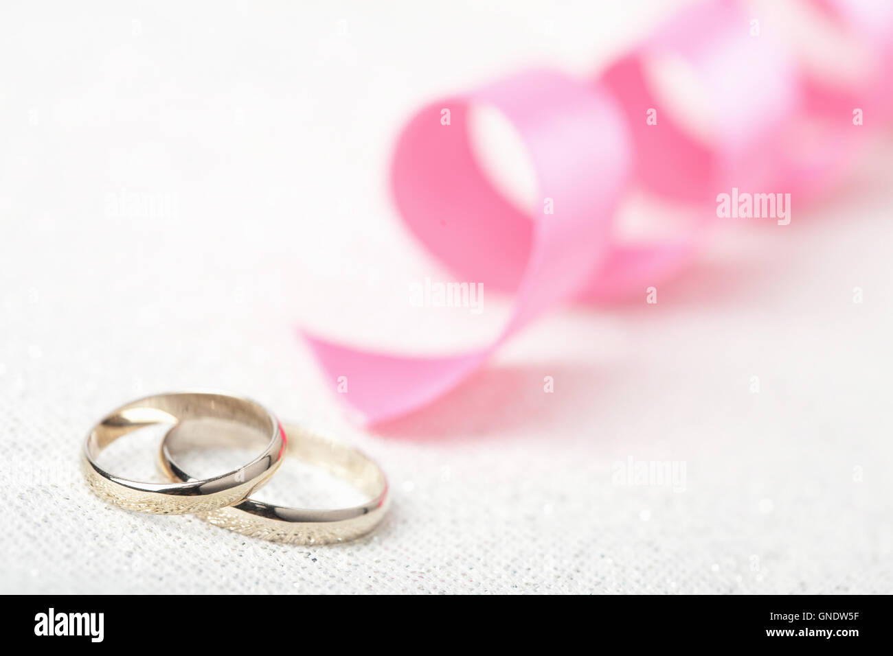 Beautiful golden wedding rings hi-res stock photography and images - Alamy