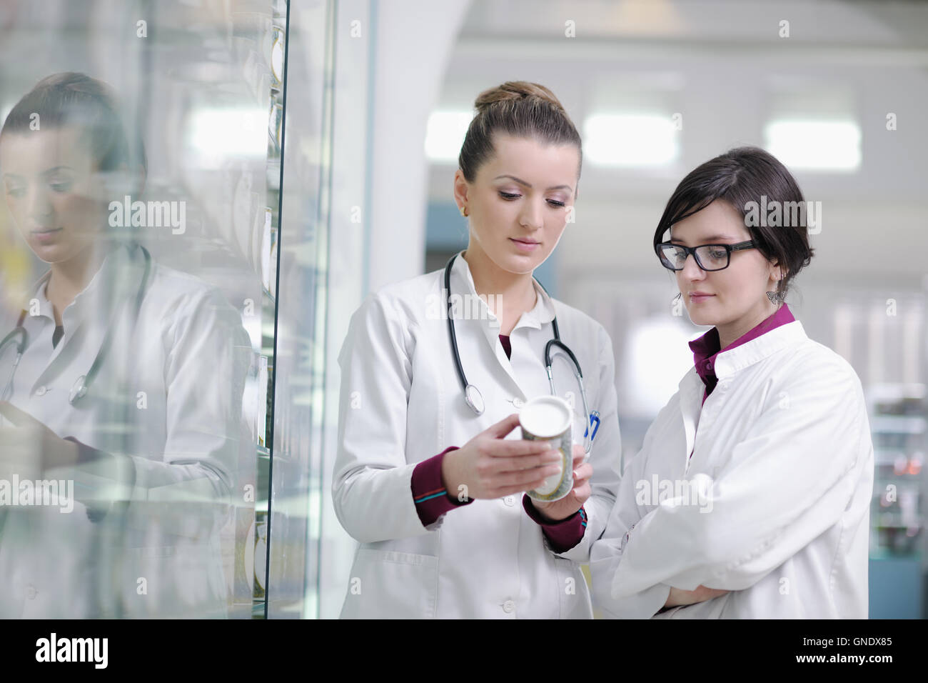 team of pharmacist chemist woman in pharmacy drugstore Stock Photo - Alamy