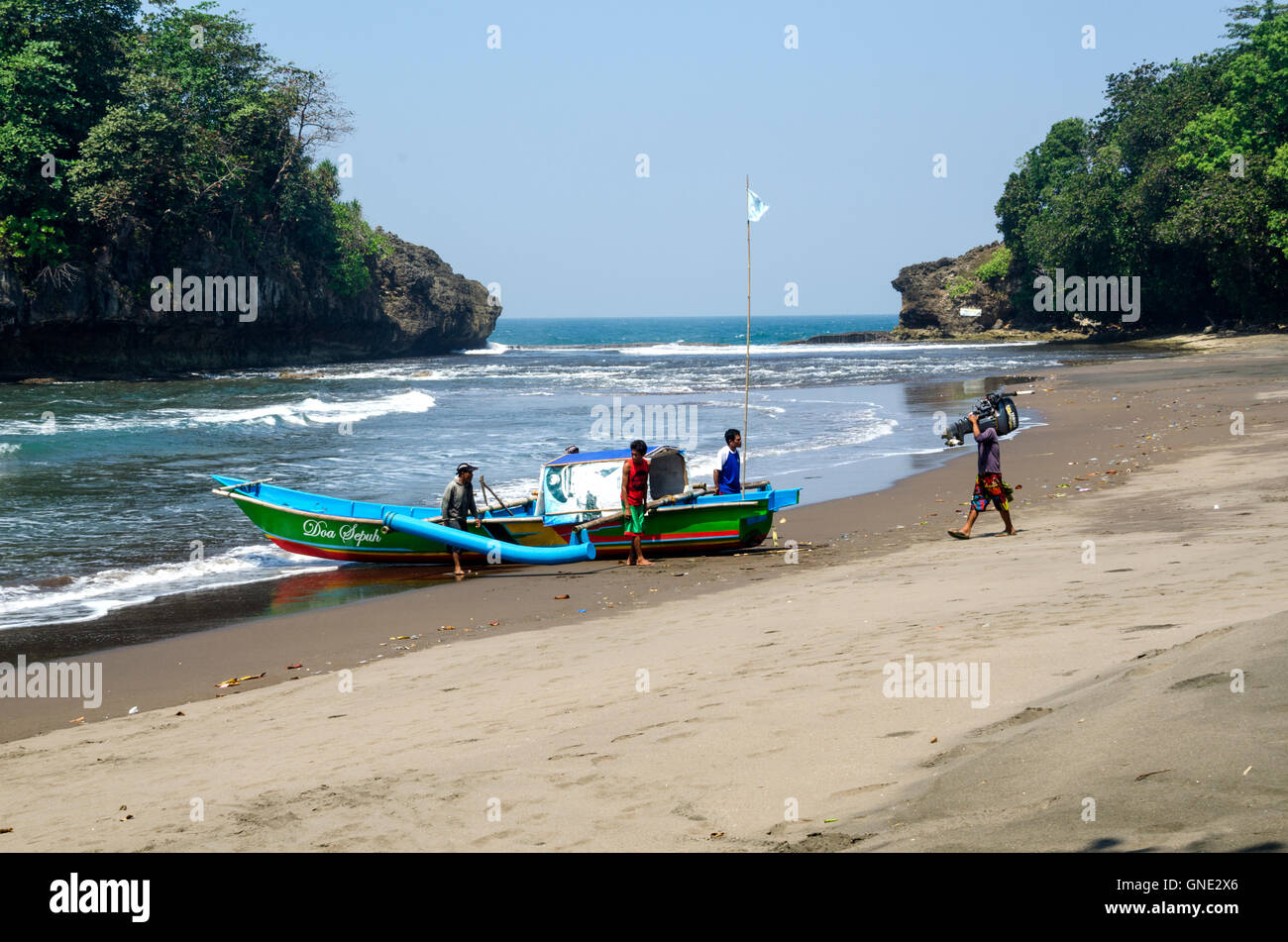 fisherman is going to put the boat engine Stock Photo Alamy