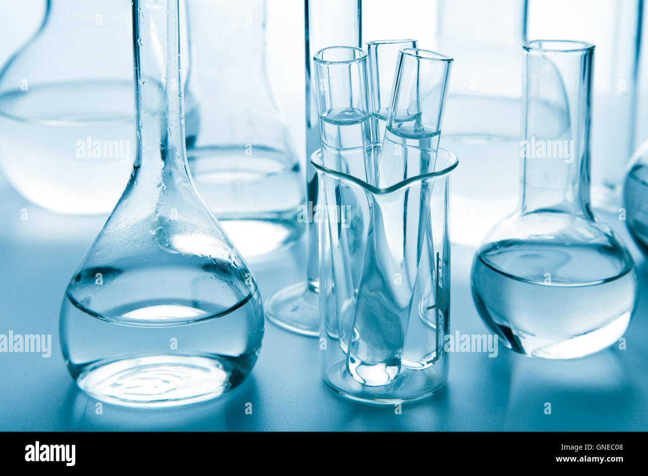 Labware Blue laboratory glassware toned blue Stock Photo - Alamy