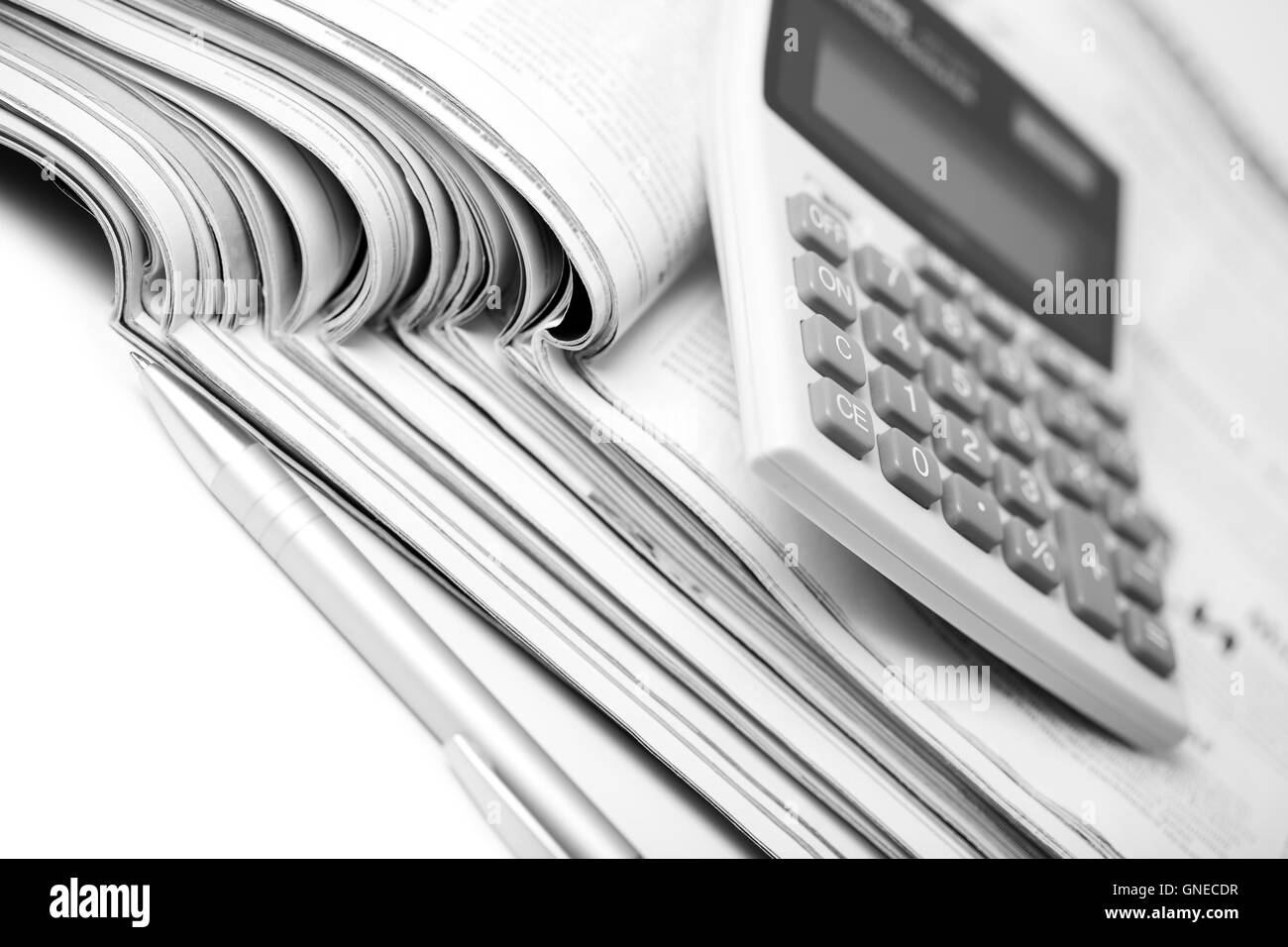 newspapers, pen and calculator. business background Stock Photo