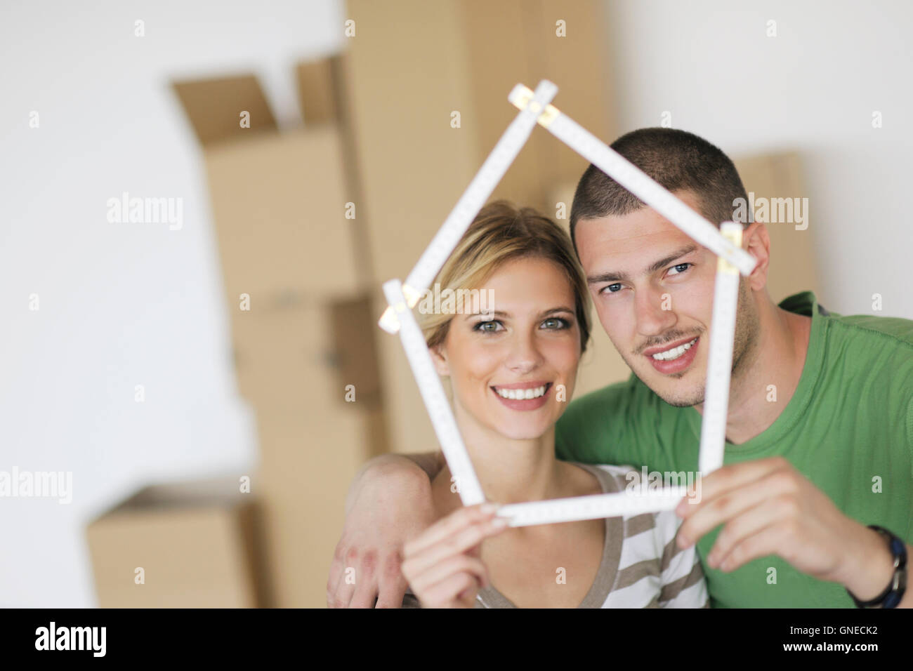 Young couple moving in new home Stock Photo - Alamy