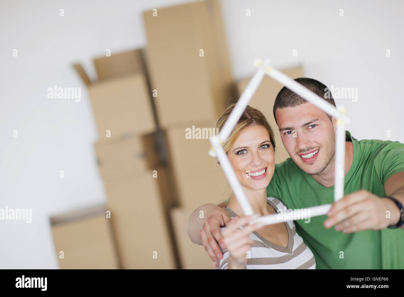 Young couple moving in new home Stock Photo - Alamy