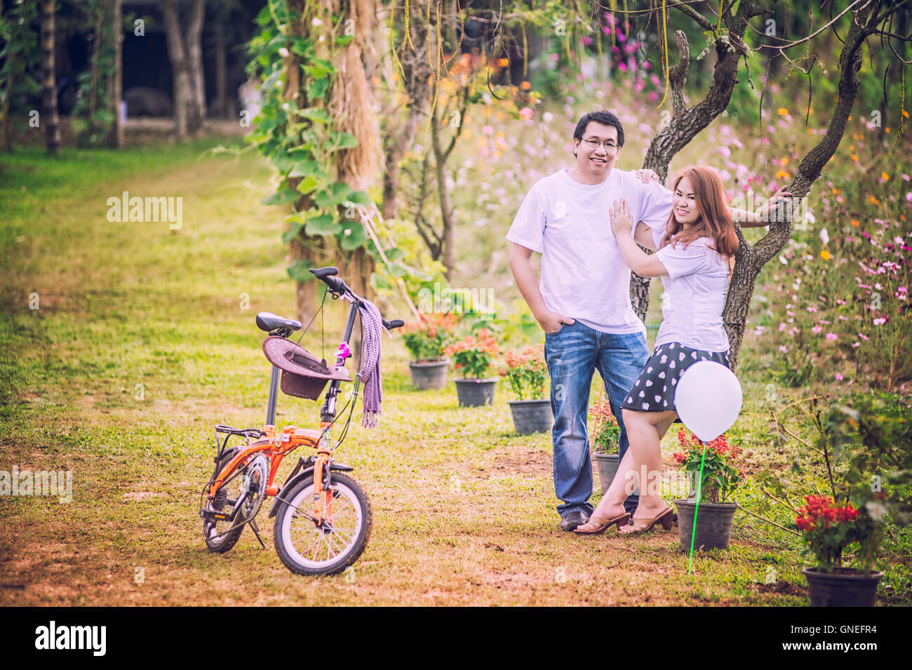 asia Young happy couple in the park on outdoor, love concept Stock Photo