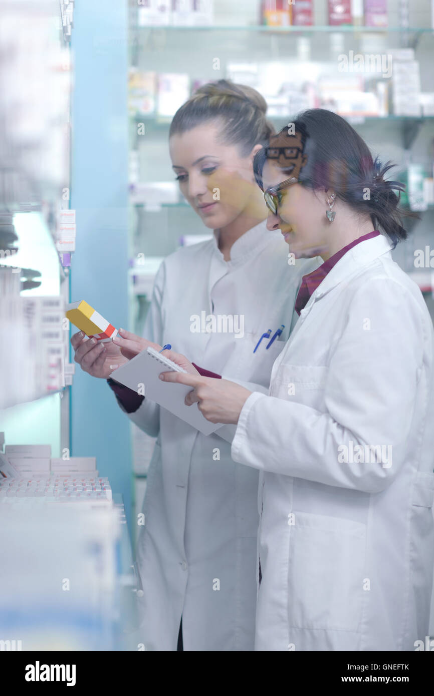 team of pharmacist chemist woman in pharmacy drugstore Stock Photo - Alamy