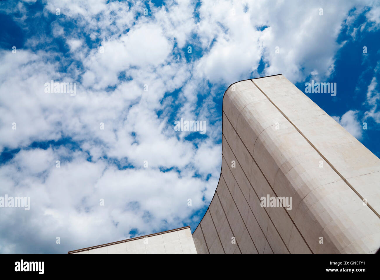 modern office building on a background of cloudy sky Stock Photo - Alamy