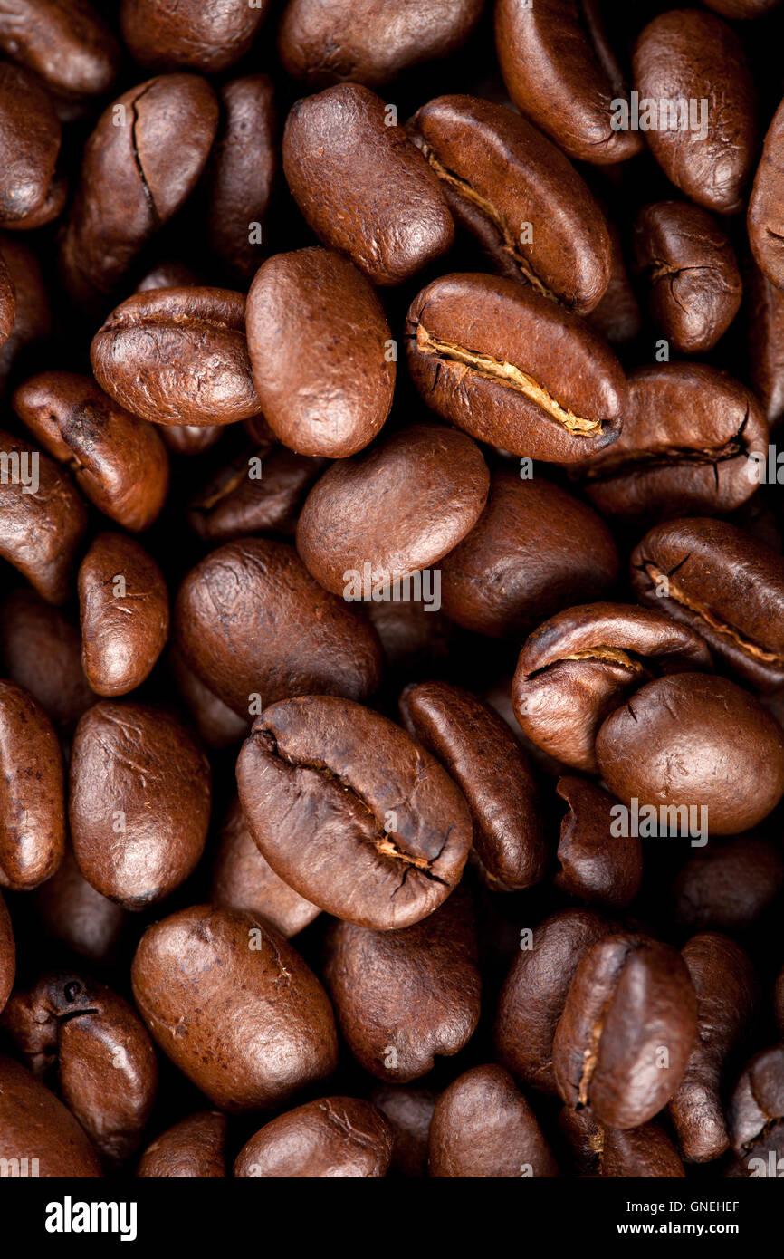 roasted coffee beans background Stock Photo - Alamy