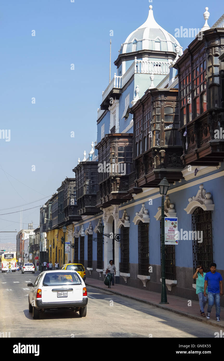 Lima, Petu -December 31, 2013: Street view of Lima old town with traditional colorful houses and wooden balcony. Stock Photo