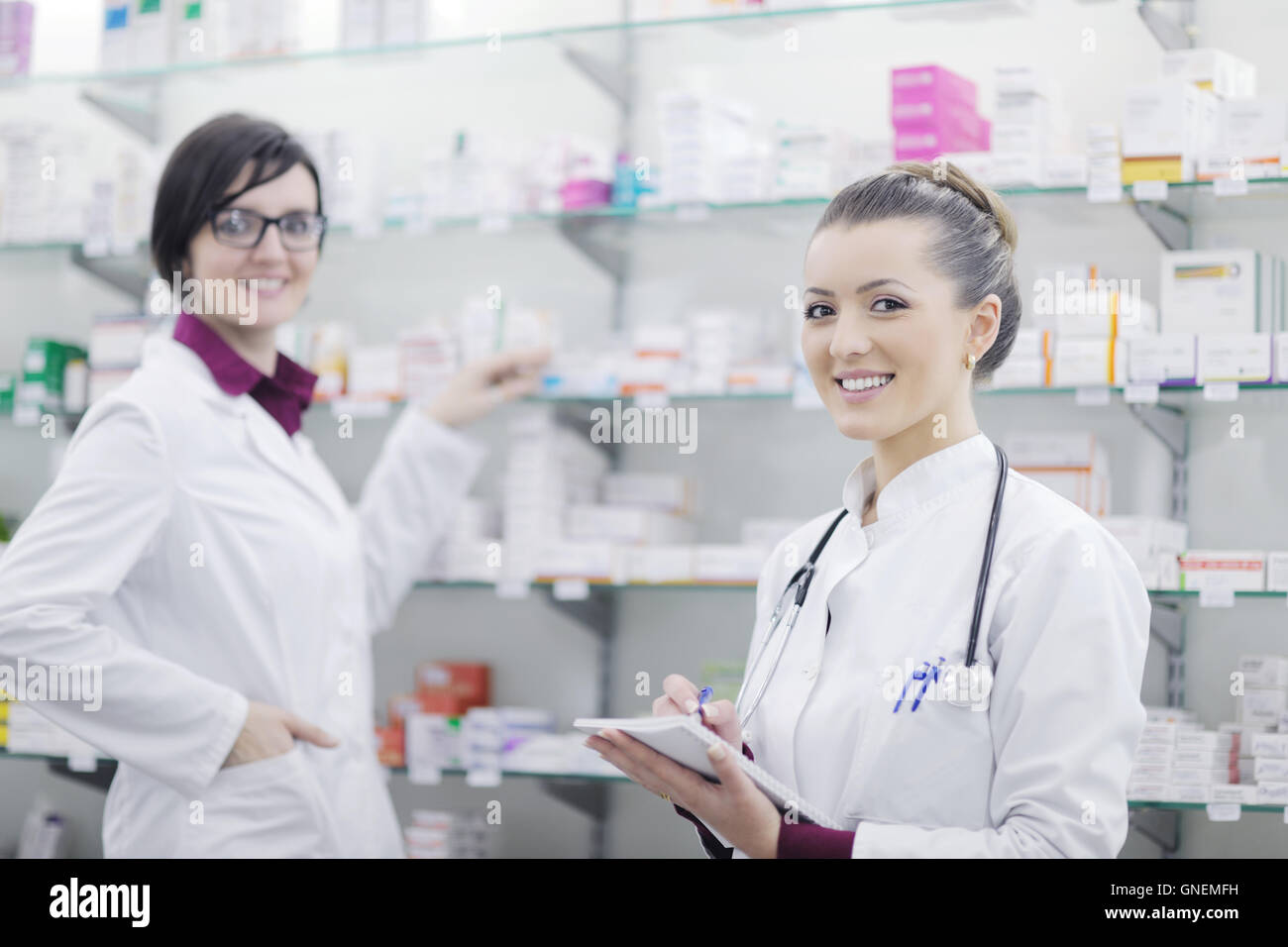 team of pharmacist chemist woman in pharmacy drugstore Stock Photo - Alamy