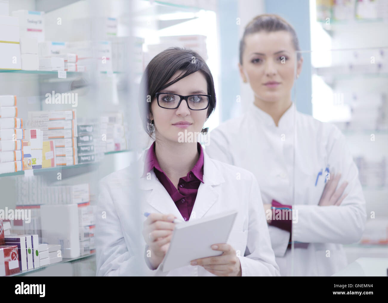team of pharmacist chemist woman in pharmacy drugstore Stock Photo - Alamy