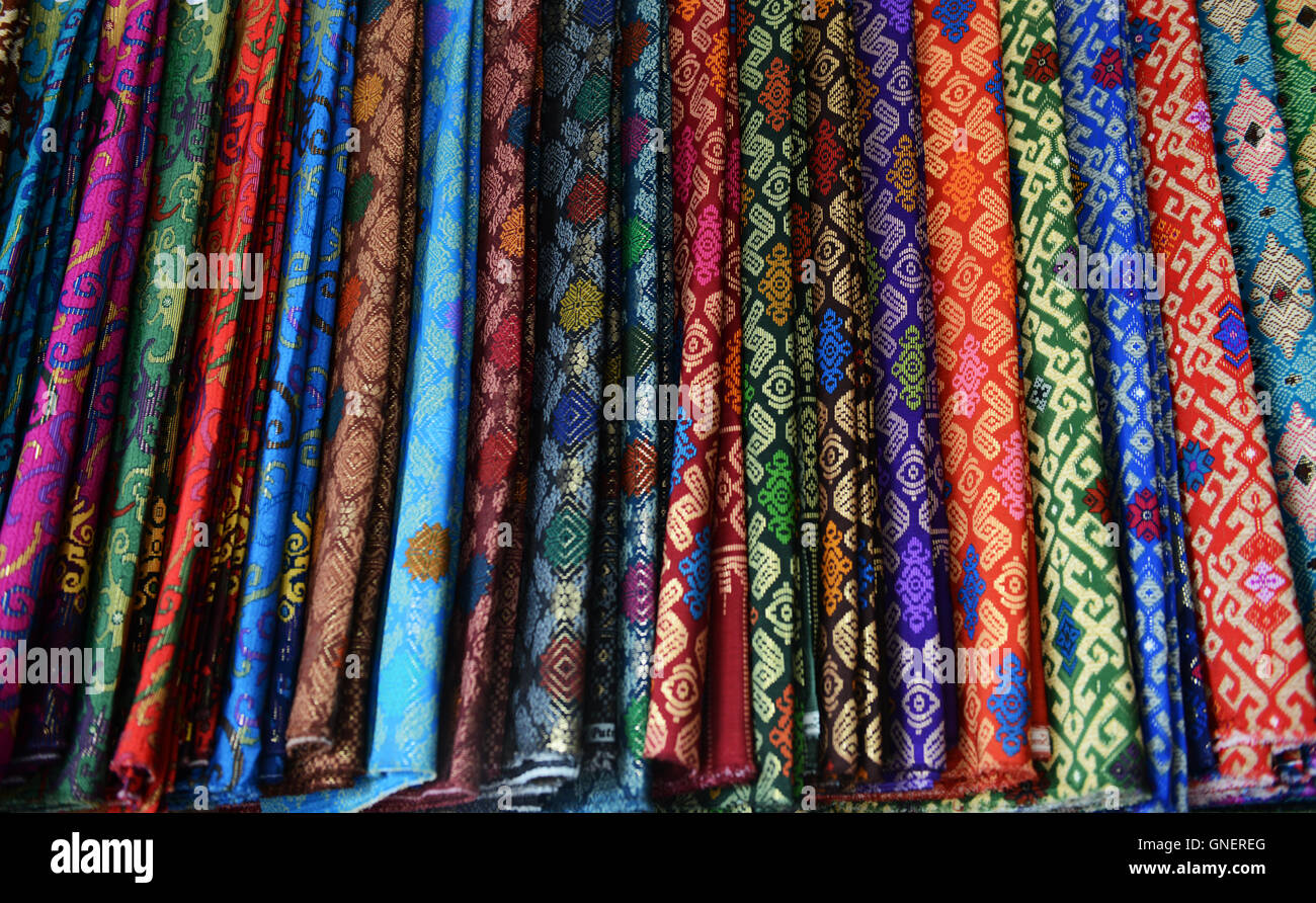 Traditional fabrics from Sarawak sold in the Kuching market Stock Photo