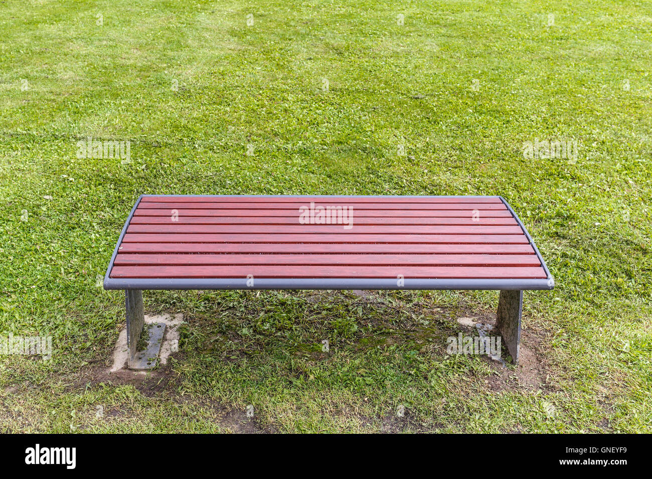 Wooden park bench in nature Stock Photo Alamy