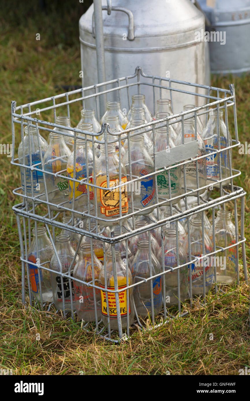 empty glass milk bottles and milk churns at Great Dorset Steam Fair