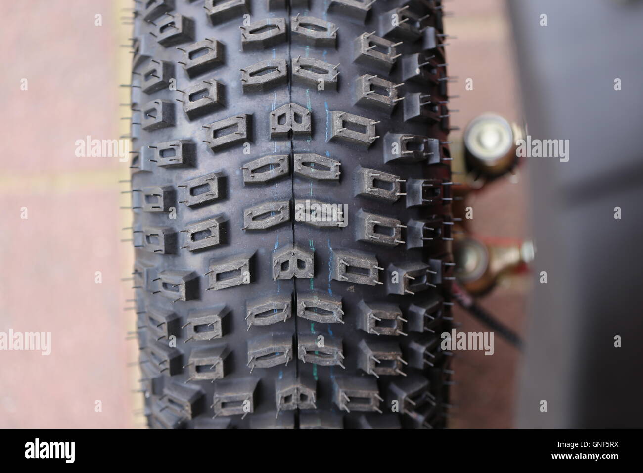 Quad Bike Tire. New quadbike tire, rubber texture, close up. Stock Photo