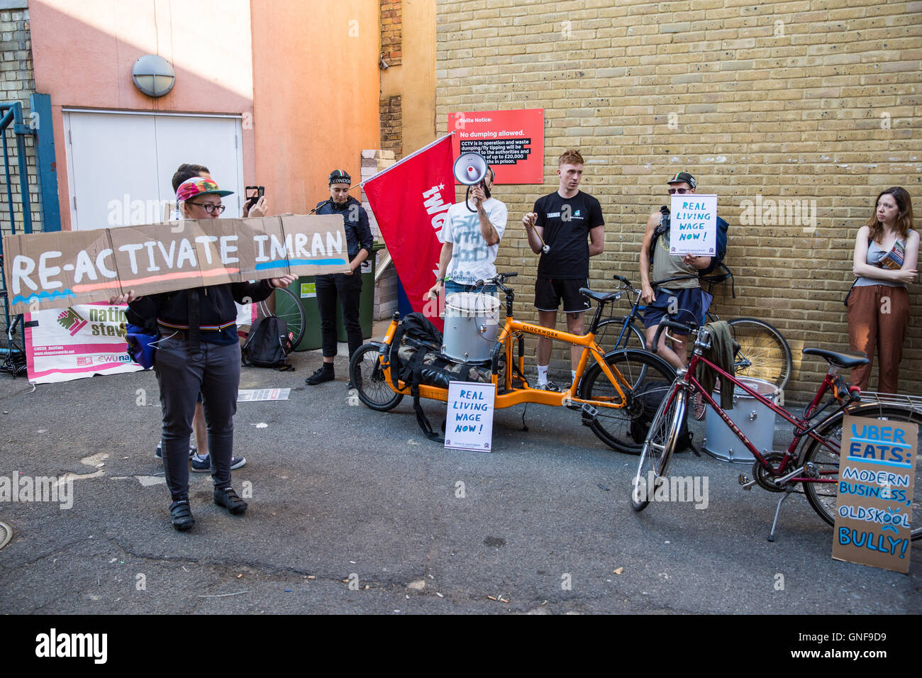 London, UK. 30th Aug, 2016. Members and supporters of the IWGB trade union protest outside the headquarters of UberEats, Uber's fast-food delivery service, to call for the reinstatement of Imran Siddiqui, the organiser of an earlier protest against a pay cut for the company's couriers. Credit:  Mark Kerrison/Alamy Live News Stock Photo
