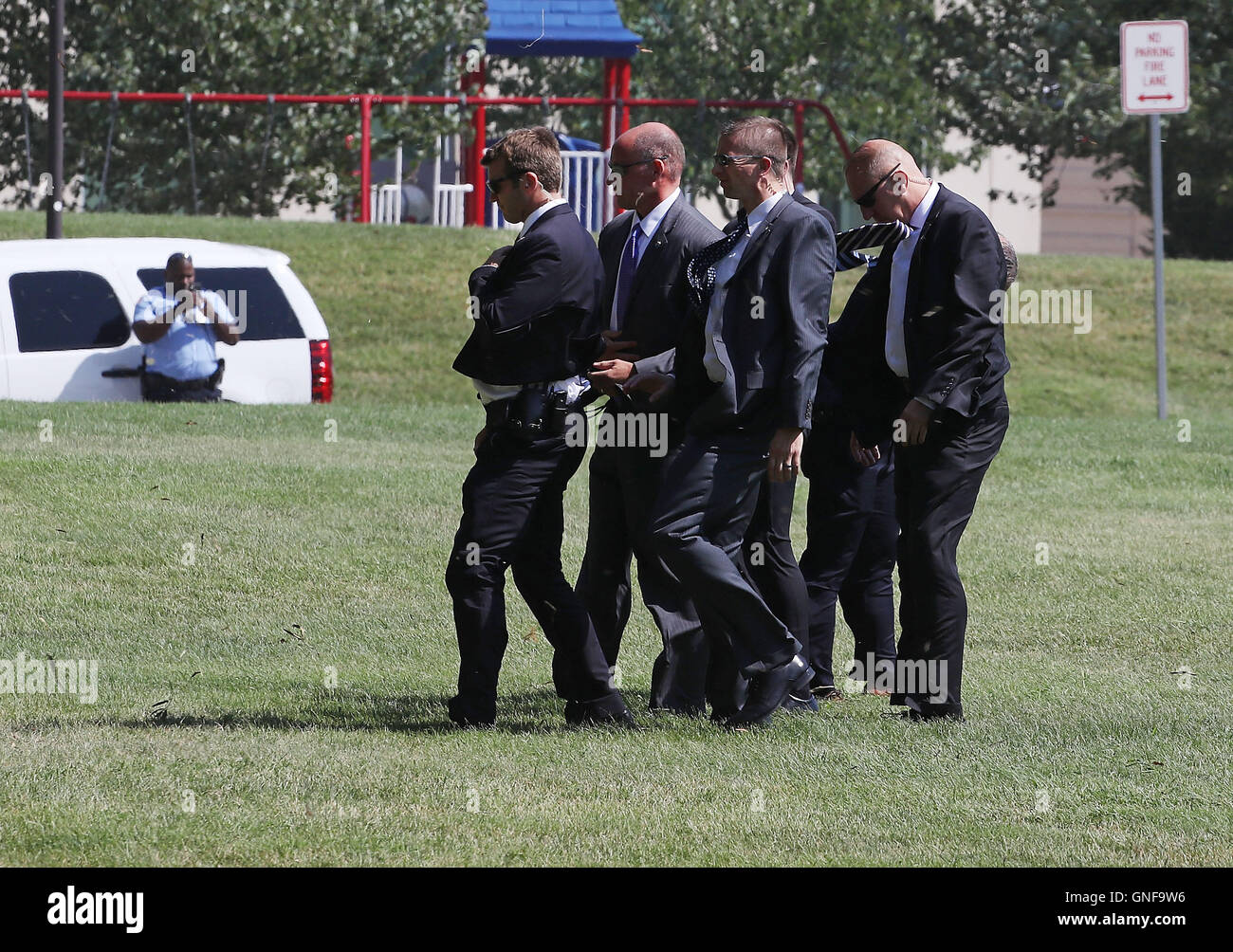 Obama Walter Reed Members of the United States Secret Service turn away from the prop ...