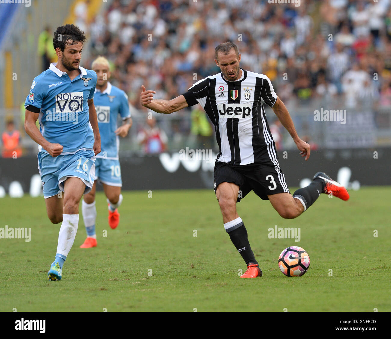 Marco Parolo and  Giorgio Chiellini during the Italian Serie A football match between S.S. Lazio and F.C. Juventus at the Olympic Stadium in Rome, on august 27, 2016. Stock Photo