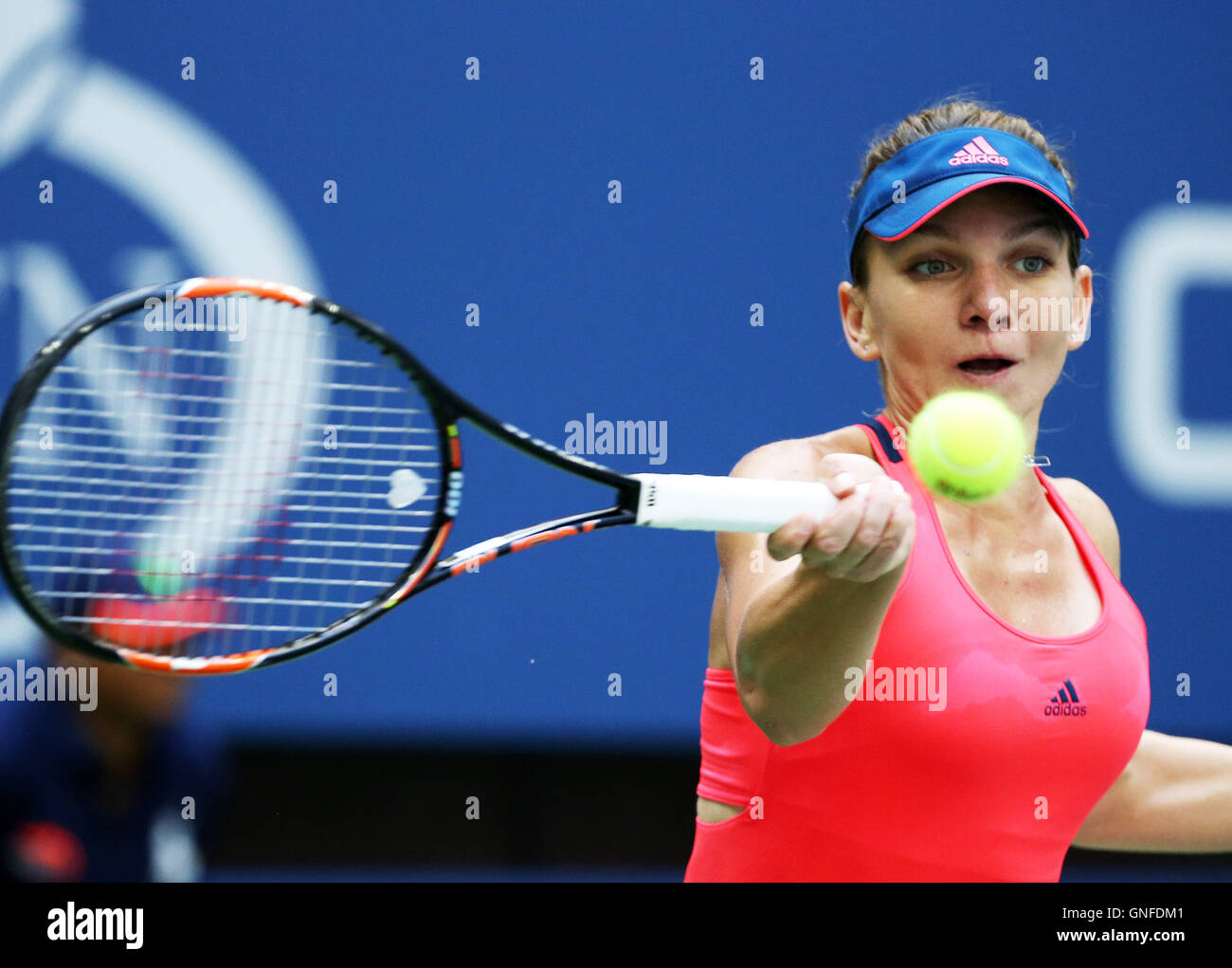 New York, USA. 30th Aug, 2016. Simona Halep of Romania returns a ball to Kirsten Flipkens of Belgium during a match of the women's singles first round at the 2016 U.S. Open in New York, the United States, Aug. 30, 2016. Simona Halep won 2-0. Credit:  Qin Lang/Xinhua/Alamy Live News Stock Photo