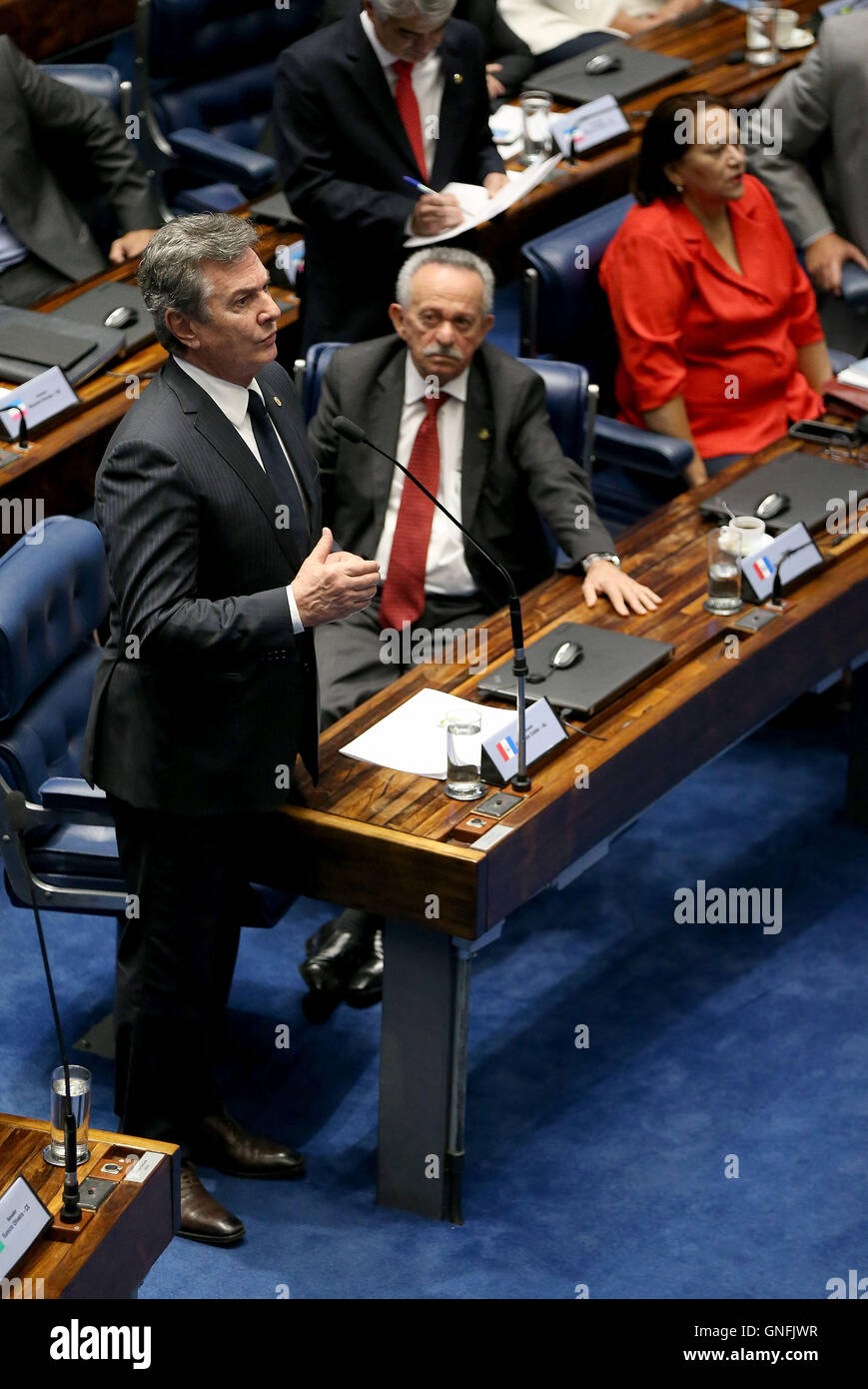 Brasilia, Brazil. 31st Aug, 2016. Brazil's senator and former president Fernando Collor de Mello (L) speaks during Senate's final impeachment session of Brazil's suspended President Dilma Rousseff in Brasilia, capital of Brazil, on Aug. 31, 2016. Brazilian senators will vote on Wednesday to decide whether Brazil's suspended President Dilma Rousseff will be impeached or not. The impeachment requires a two-thirds vote, or 54 of the 81 senators. Credit:  Li Ming/Xinhua/Alamy Live News Stock Photo