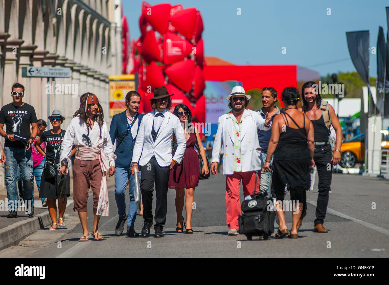 Venice, Italy. 31th August, 2016. A group of doubles walks to the Hotel Excelsior during the 73rd Venice Film Festival. Credit:  Simone Padovani / Awakening / Alamy Live News Stock Photo