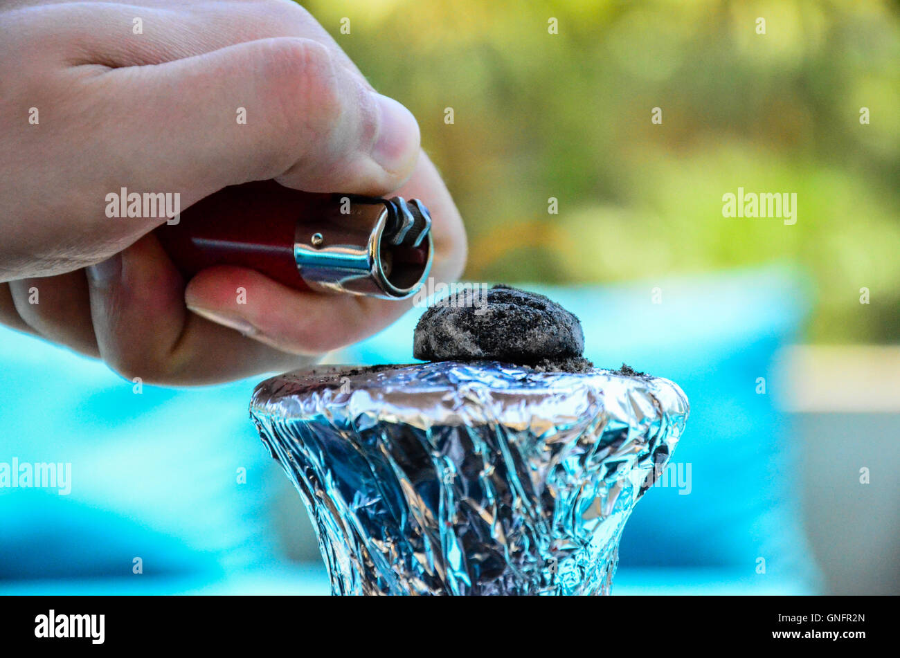 Preparation The Hookah With Charcoal For Smoking Stock Photo Alamy