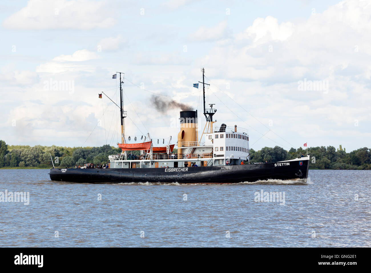 Historic icebreaker STETTIN, today a passenger ship making excursions, on the Elbe river Stock Photo