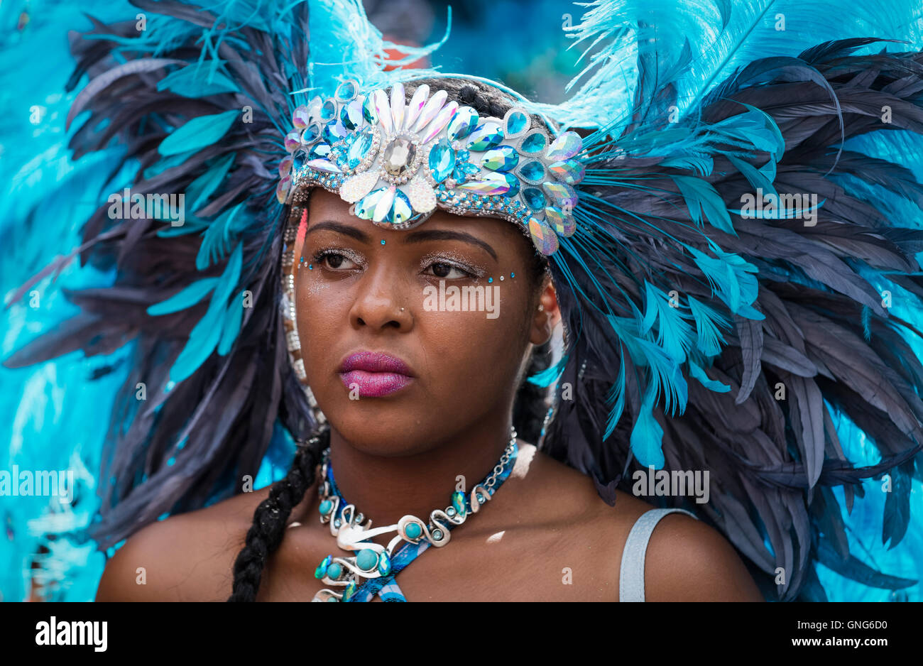 Blue feather headdress hi-res stock photography and images - Alamy