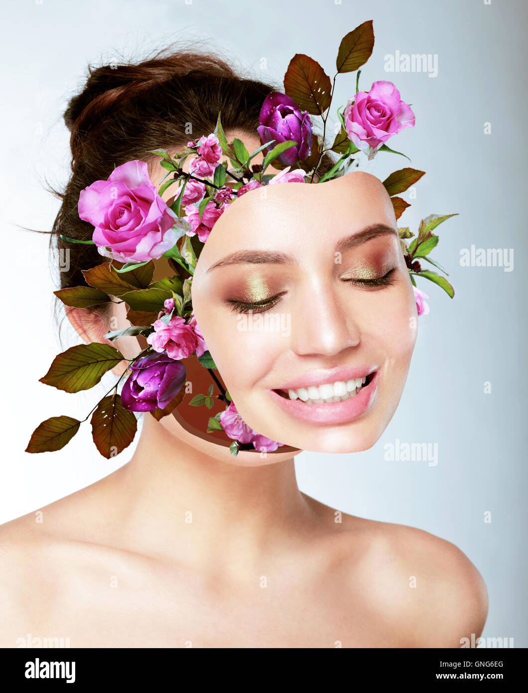 Art portrait of beautiful young women. Flowers, Mask, face. Concept, idea, design. Stock Photo