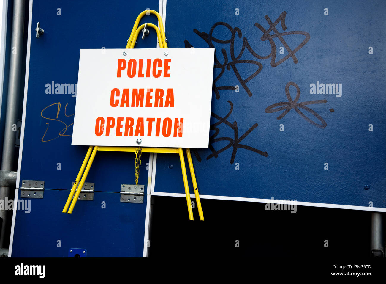 Nottinghill Carnival 2016 . Warning sign saying 'Police camera operation' Stock Photo