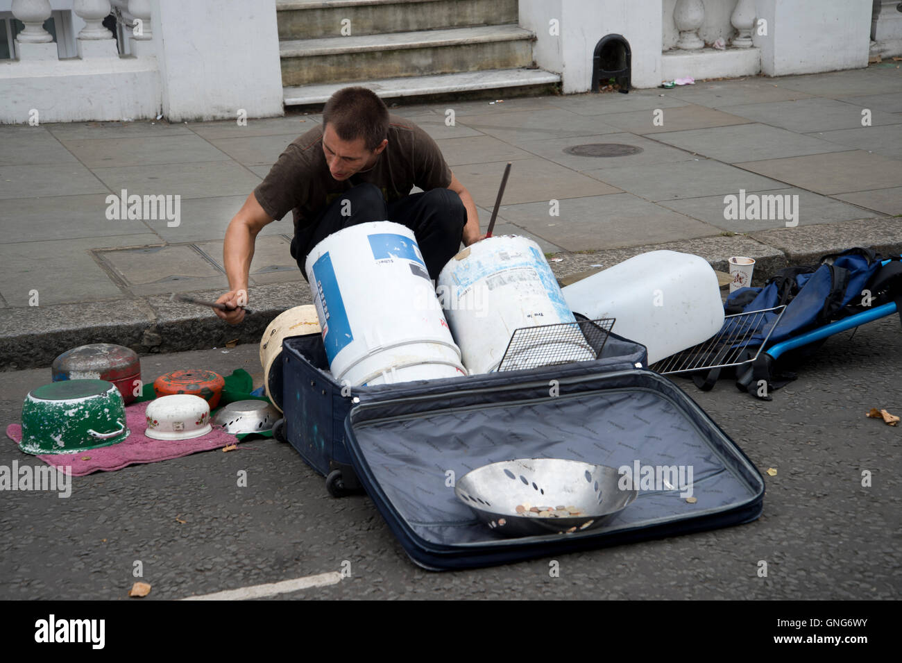 Nottinghill Carnival 2016 . A busker makes music from pots, pans and ...